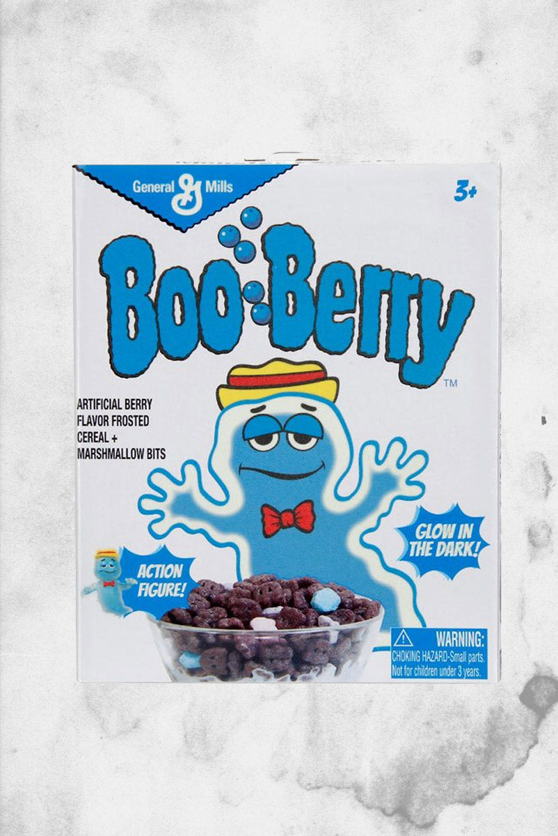 A box of General Mills' "Boo Berry" cereal overlaid upon a white marble backdrop.