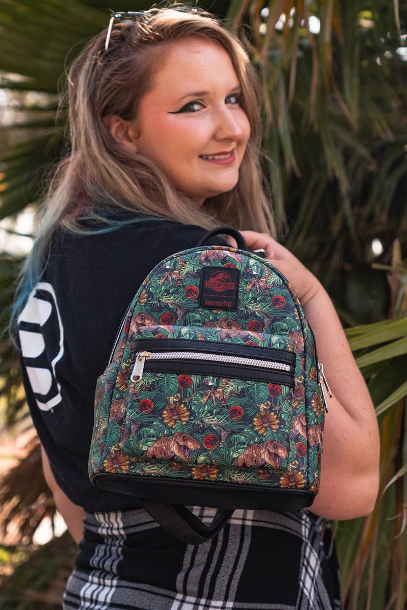 jurassic mini backpack Grotto Treasures Exclusive looming over a forest Jurassic Park - Dinosaur Jungle