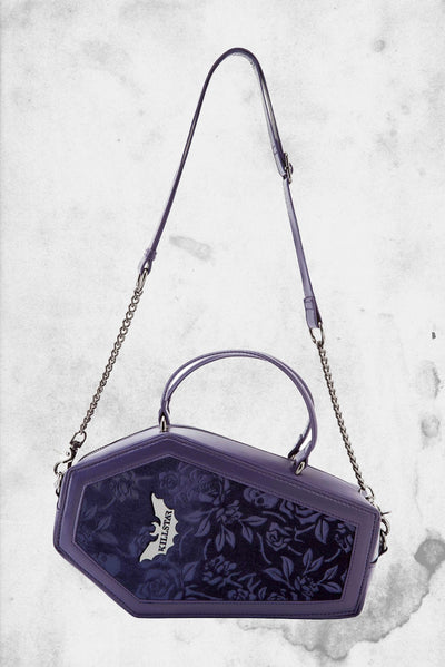 purple coffin shaped handbag